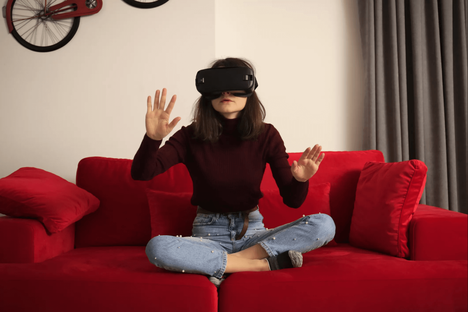 Image of a woman on a couch doing VR therapy